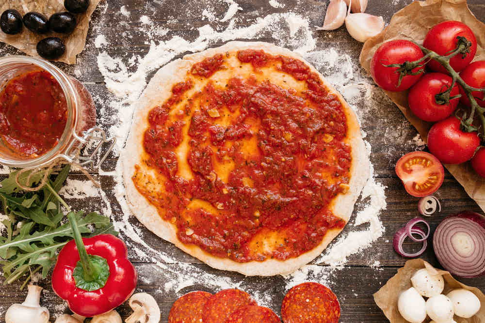Cooking,Pizza.,Pizza,Ingredients,On,The,Wooden,Table,,Top,View.
